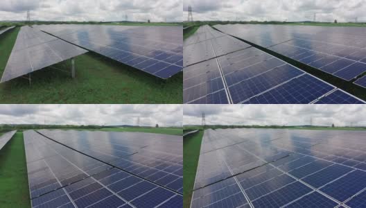 近距离的太阳能电站面板在绿色能源领域电生态创新自然环境。农田旁边的太阳能电池板。可再生能源高清在线视频素材下载