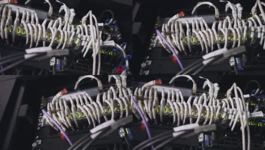 近距离拍摄的数据服务器与以太网线和闪烁的硬盘驱动器灯高清在线视频素材下载