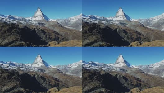瑞士阿尔卑斯山脉的马特洪峰映衬着蓝天高清在线视频素材下载