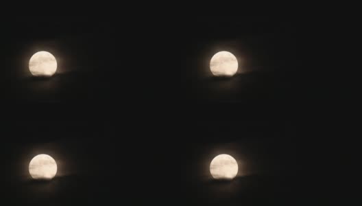 满月升起时的时间间隔，部分被云遮住高清在线视频素材下载