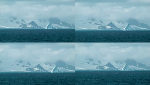 裸露的南极洲景观和阳光下的冰山高清在线视频素材下载