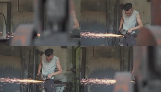 亚洲铁匠在他的铁匠铺里打磨高清在线视频素材下载
