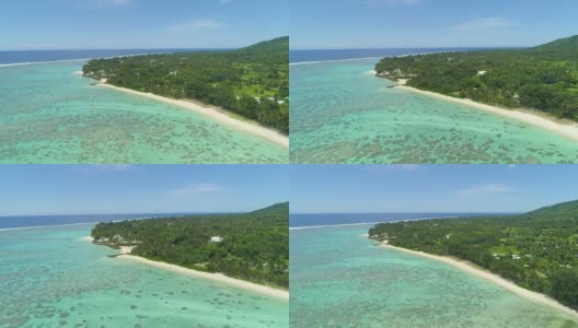 航拍:飞越壮观的珊瑚礁，前往海滨度假胜地。高清在线视频素材下载