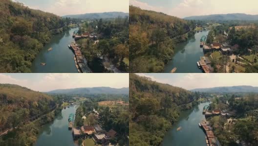 风景:度假木屋漂浮和山雾在葵河在西约克，北碧，泰国高清在线视频素材下载