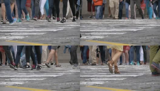 人群在人行横道上慢动作行走的双腿高清在线视频素材下载