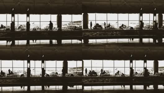 机场乘客的剪影。高清在线视频素材下载