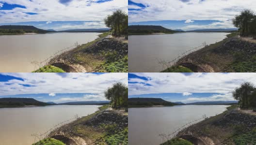 “湄洪”河与山背景下多云的天空高清在线视频素材下载
