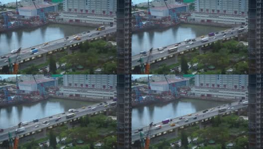 鸟瞰香港白天的高速公路和九龙市区高清在线视频素材下载