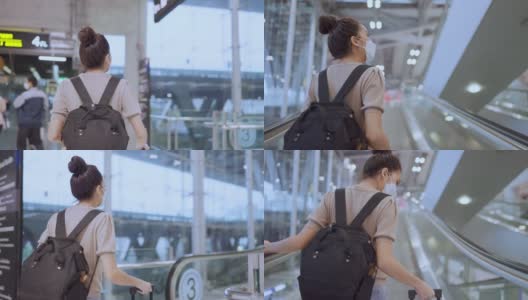 在机场候机楼的自动扶梯上背着背包和行李箱的亚洲女性乘客背影，新冠肺炎封锁结束后的旅行生活方式高清在线视频素材下载
