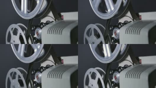在电影放映机倒带16毫米胶片高清在线视频素材下载