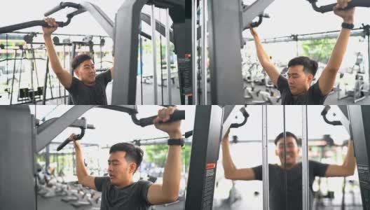 亚洲男人在做引体向上的锻炼高清在线视频素材下载