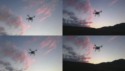 无人机在夜空的背景下飞过小山高清在线视频素材下载
