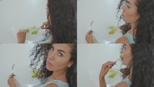 节食中女人吃沙拉高清在线视频素材下载