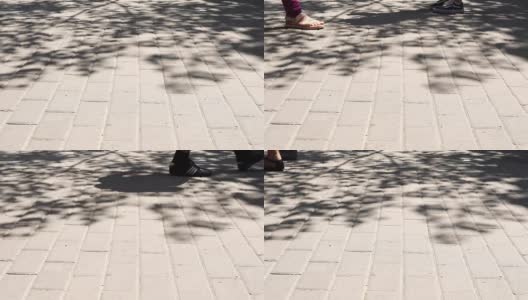 概念人群脚与鞋的特写。无名的人走在街上高清在线视频素材下载