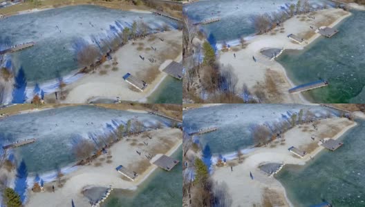 人们在结冰的湖面上滑冰高清在线视频素材下载