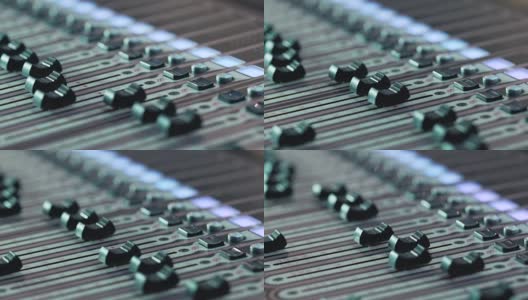 音频混频器在一个工作室的自动旋钮移动上控制台高清在线视频素材下载