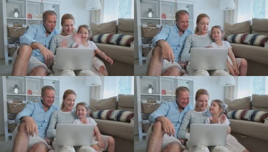 有孩子的家庭使用笔记本电脑视频通话摄像头高清在线视频素材下载