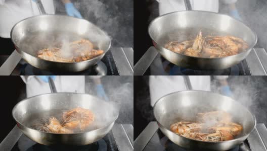 在煎锅上准备的油炸虎虾。厨师在锅里翻炒，搅拌，投掷，特写。慢动作的食物视频。给厨房。高清高清在线视频素材下载
