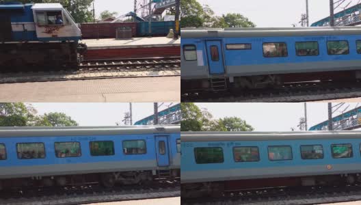 沙特布迪特快-12041(豪拉枢纽至新杰尔拜古里)，这列印度高速列车在郊区铁路枢纽火车站的铁轨上运行。印度加尔各答，西孟加拉邦高清在线视频素材下载