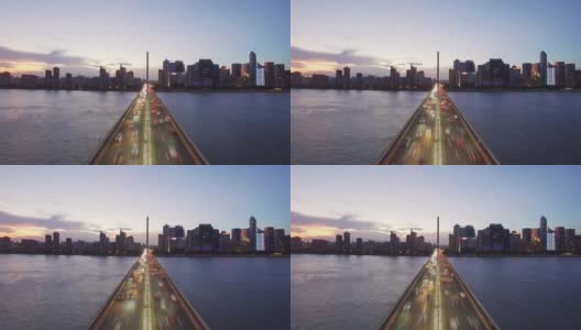 大桥连接城市与日落高清在线视频素材下载