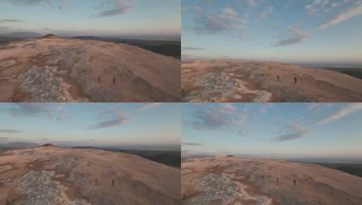 两名游客田园诗般的空中摄影，到处都是岩石高清在线视频素材下载