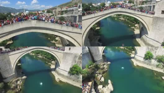 波斯尼亚和黑塞哥维那，一名勇敢的男子从莫斯塔尔桥上跳下高清在线视频素材下载