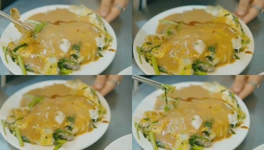 夜市-特写台湾美食牡蛎蛋卷高清在线视频素材下载