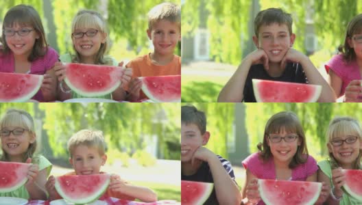 一群孩子在户外吃西瓜高清在线视频素材下载