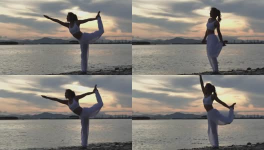 年轻女子在山海练习瑜伽。高清在线视频素材下载