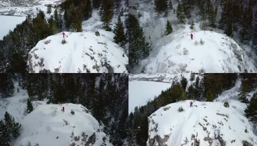 滑雪者滑雪旅游在风景陡峭的岩石露头高清在线视频素材下载