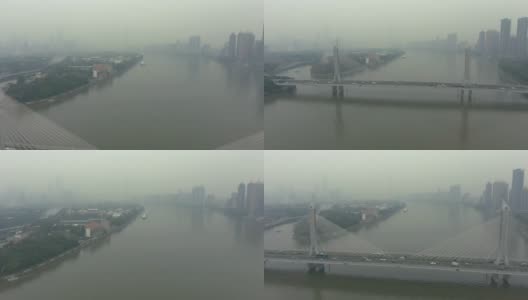 雾霾中的广州大桥，车流和城市景观。中国鸟瞰图高清在线视频素材下载
