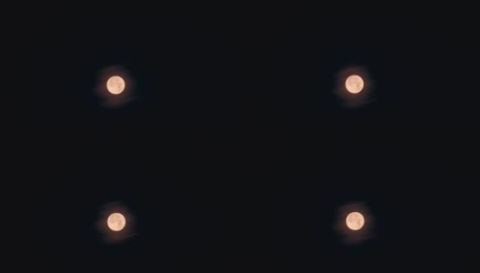 夜空中带着橙色色调的满月高清在线视频素材下载