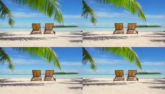 法属波利尼西亚热带海滩上的两个日光浴床高清在线视频素材下载