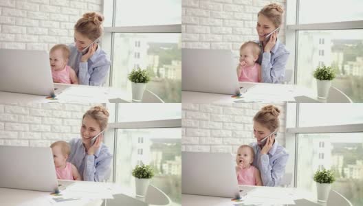 有婴儿通话电话的职业女性。商业妈妈怀上孩子高清在线视频素材下载