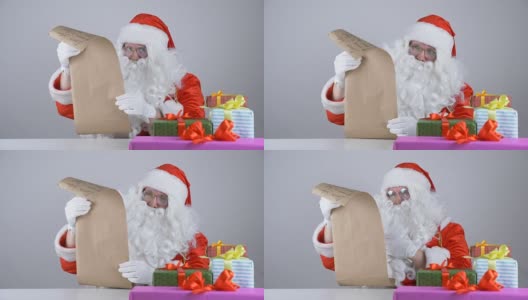 圣诞老人以50帧/秒的速度读孩子写的信高清在线视频素材下载