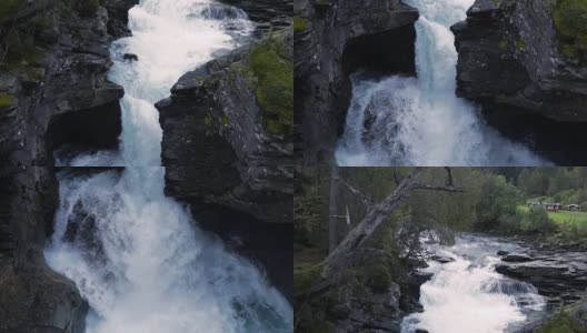 HD慢动作瀑布在挪威与岩石和森林，潘Down高清在线视频素材下载