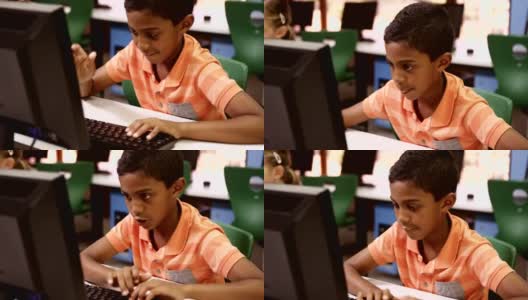 学生在教室里使用个人电脑学习高清在线视频素材下载