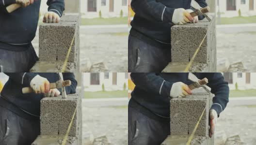 建筑工人在建筑工地建造砖墙高清在线视频素材下载
