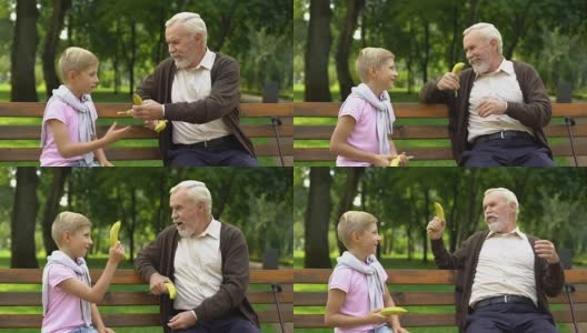 爷爷和孙子玩火枪手，打香蕉，有趣的游戏，笑话高清在线视频素材下载