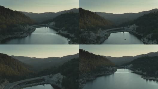 大坝和大桥的大熊湖，加利福尼亚州在日落的阴影-空中高清在线视频素材下载