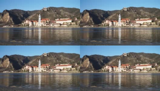 看Dürnstein在多瑙河在春天日落高清在线视频素材下载