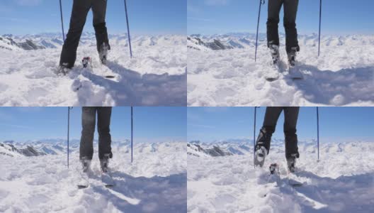 慢动作滑雪靴被插入到滑雪板的固定处并扣住它们高清在线视频素材下载
