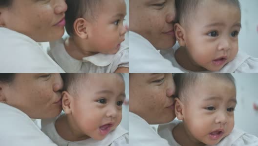 亚洲婴儿亲吻母亲高清在线视频素材下载