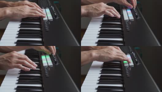音乐家在工作室玩MIDI键盘/ MIDI控制器高清在线视频素材下载