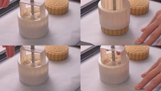 中秋月饼制作工艺——在烤盘上成型月饼糕点的形状。女性节日自制概念。高清在线视频素材下载