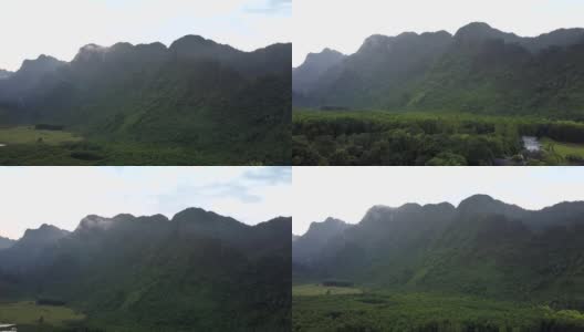 山脉覆盖着绿色浓密的热带森林高清在线视频素材下载