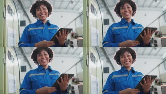 女性非裔美籍机械工程师操作数控铣床的安装过程，女性技术员工作在生产金属产品的进度线高清在线视频素材下载