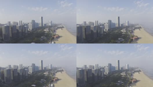 海滨城市的高端写字楼和蓝天白云下的海岸线风光高清在线视频素材下载
