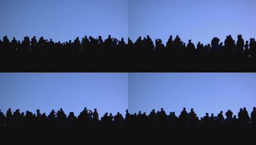 剪影:一群等待日出的人高清在线视频素材下载