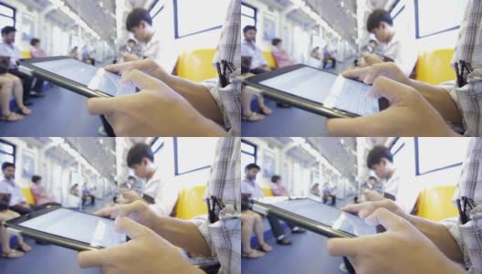特写的人的手打字虚拟键盘在火车上高清在线视频素材下载
